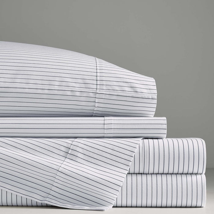 Charcoal grey and white pinstripes run horizontally on one side and vertically on the other—chic and modern no matter how you flip it. Extra soft stonewashed cotton percale for the ultimate sleeping, snoozing, stretching, “I woke up like this” experience.